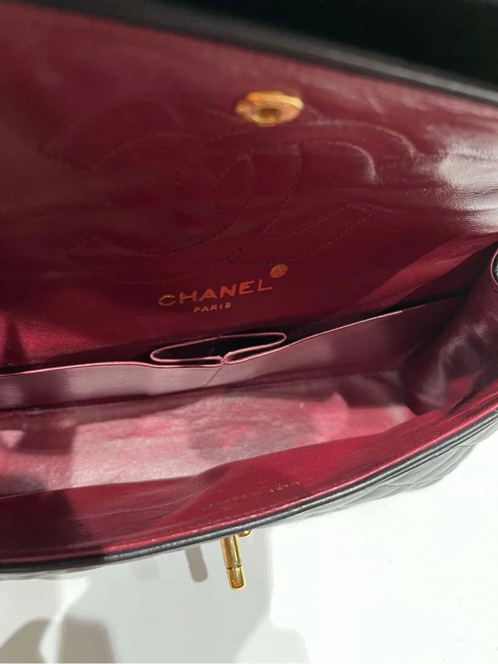 CHANEL Black Quilted Shoulder Bag with Gold Hardware